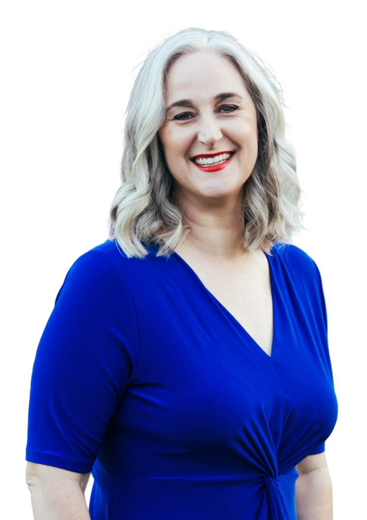 Jennifer Swann smiling in a solid blue dress.