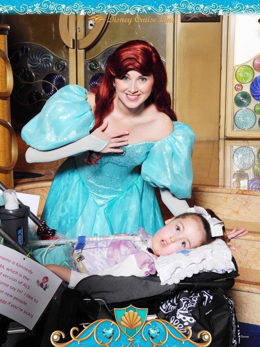 Kennedy with a Disney Princess (Ariel) on a cruise ship.